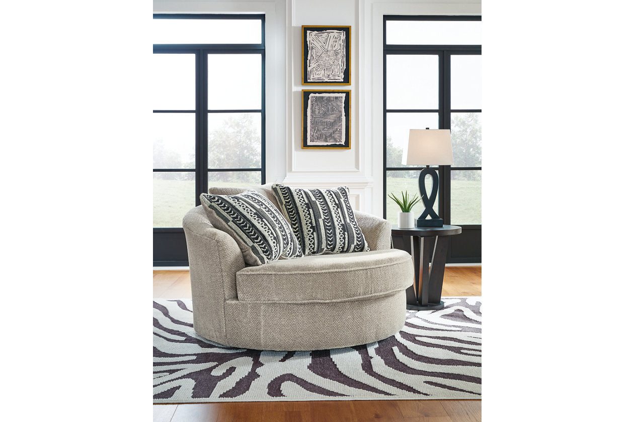 Calnita Sisal Oversized Swivel Chair and Ottoman - Ashley - Luna Furniture