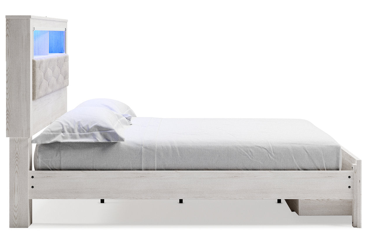 Altyra White King Upholstered Bookcase Bed with Storage from Ashley - Luna Furniture