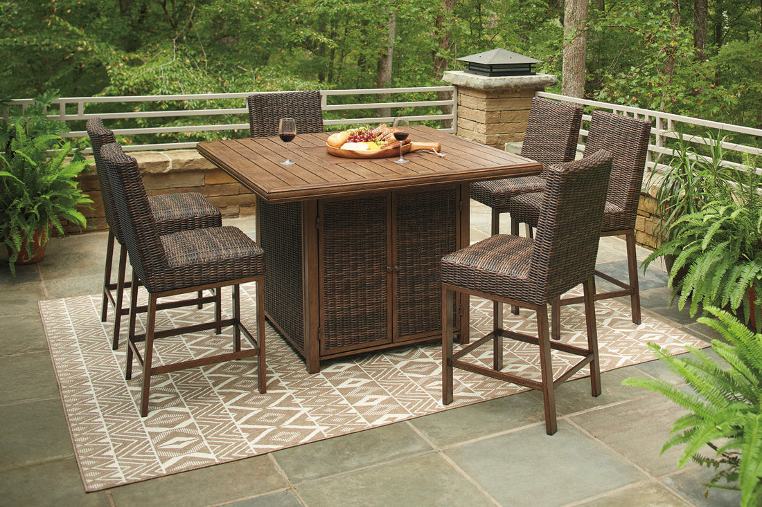 Paradise Trail Medium Brown Outdoor Bar Fire Pit Table with 6 Barstools - Ashley - Luna Furniture