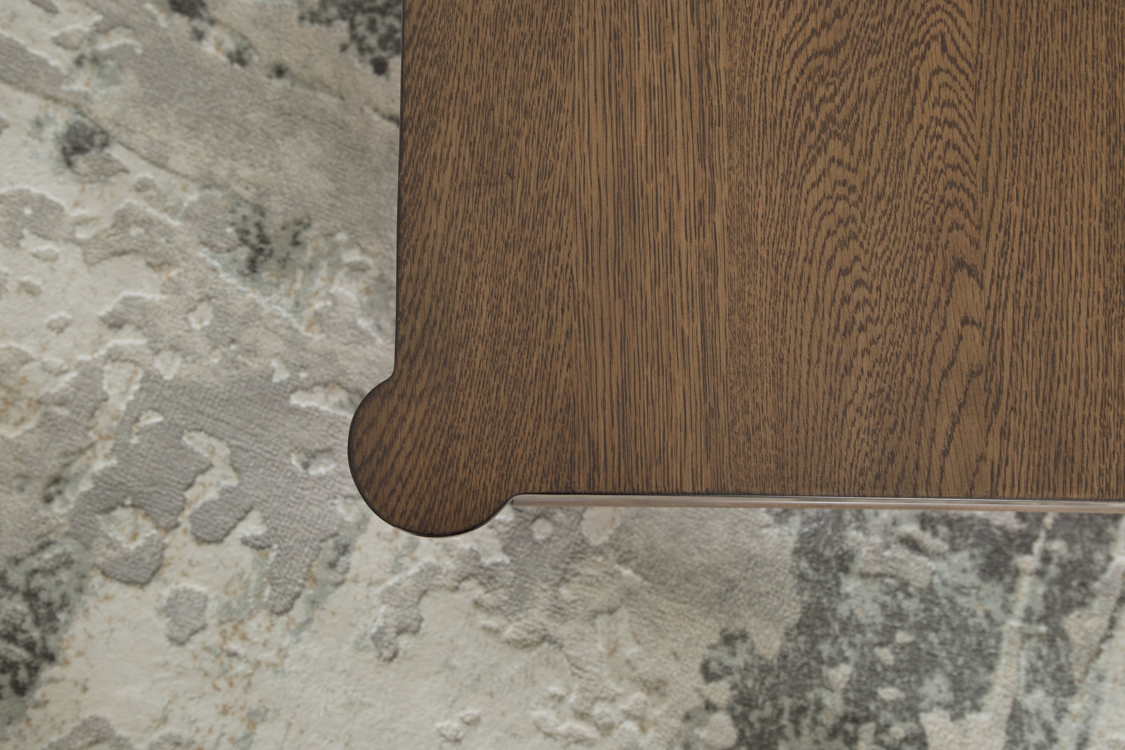Roanhowe Coffee Table with 1 End Table in Brown - PKG016518