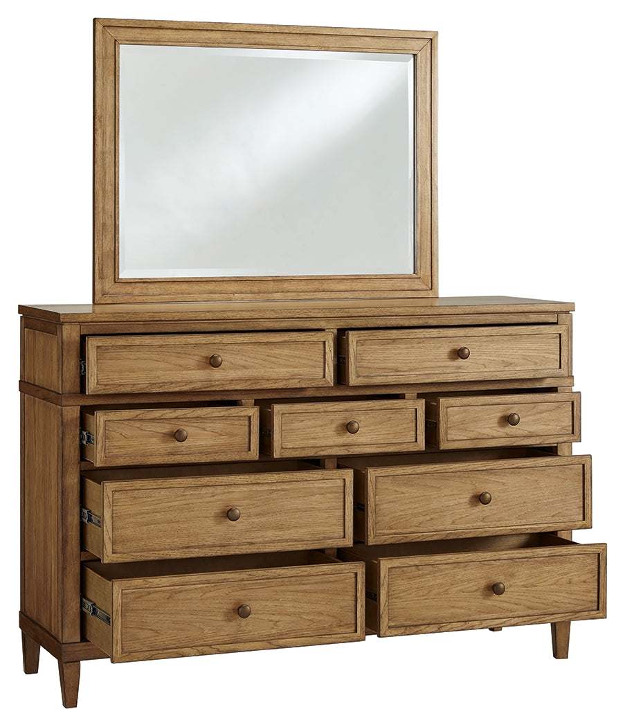Sharlance California King Upholstered Panel Bed with Mirrored Dresser and Chest in Light Brown from Ashley - Luna Furniture