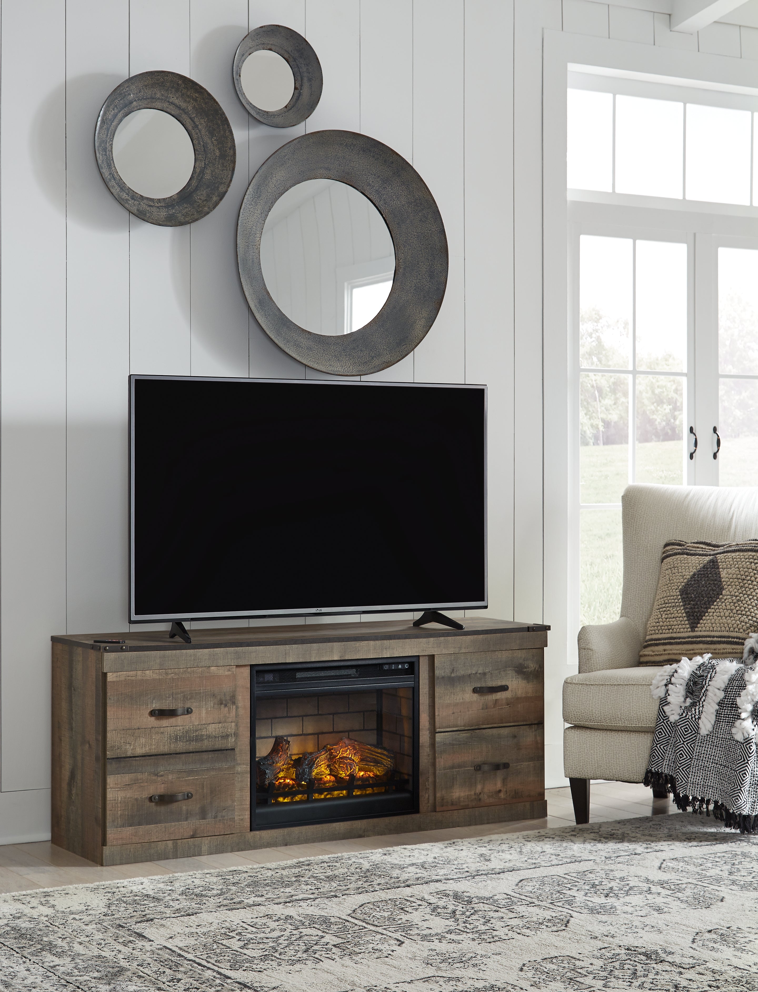 Trinell Brown TV Stand with Electric Fireplace - EW0446W8