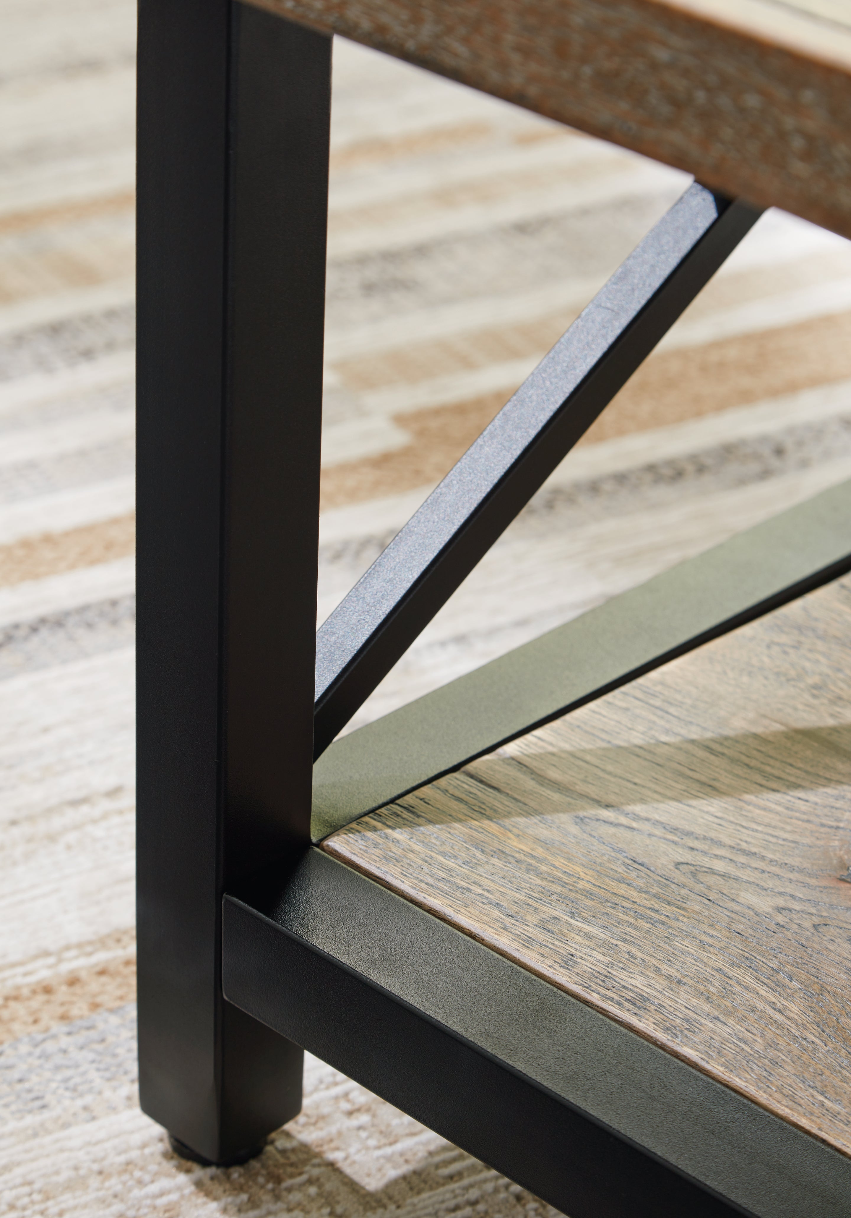 Bristenfort Brown/Black Coffee Table - T685-1 - Bien Home Furniture & Electronics