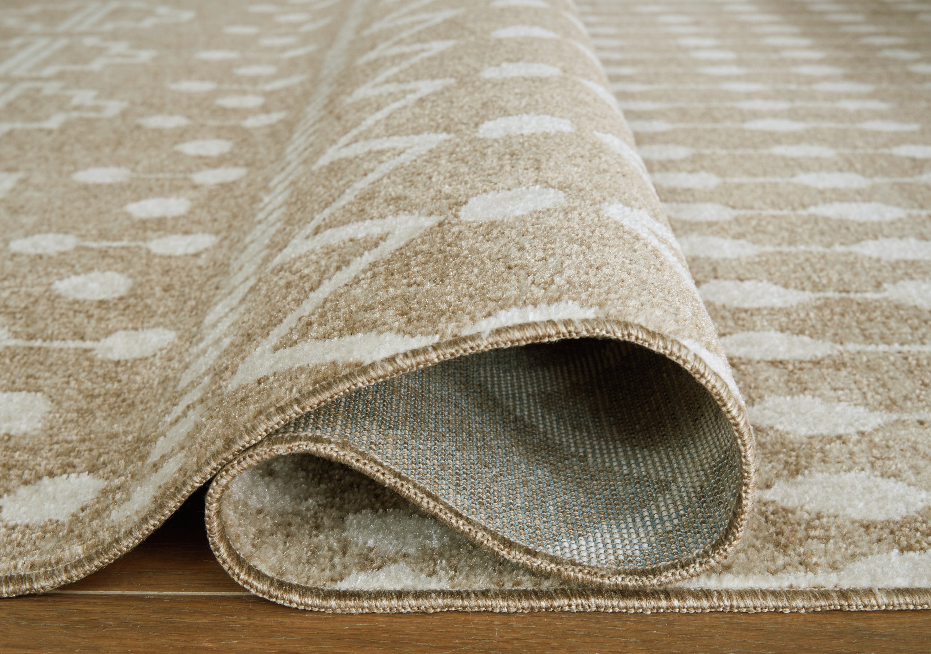 Bunchly Tan/Brown/Cream Large Rug - R406221 - Bien Home Furniture & Electronics