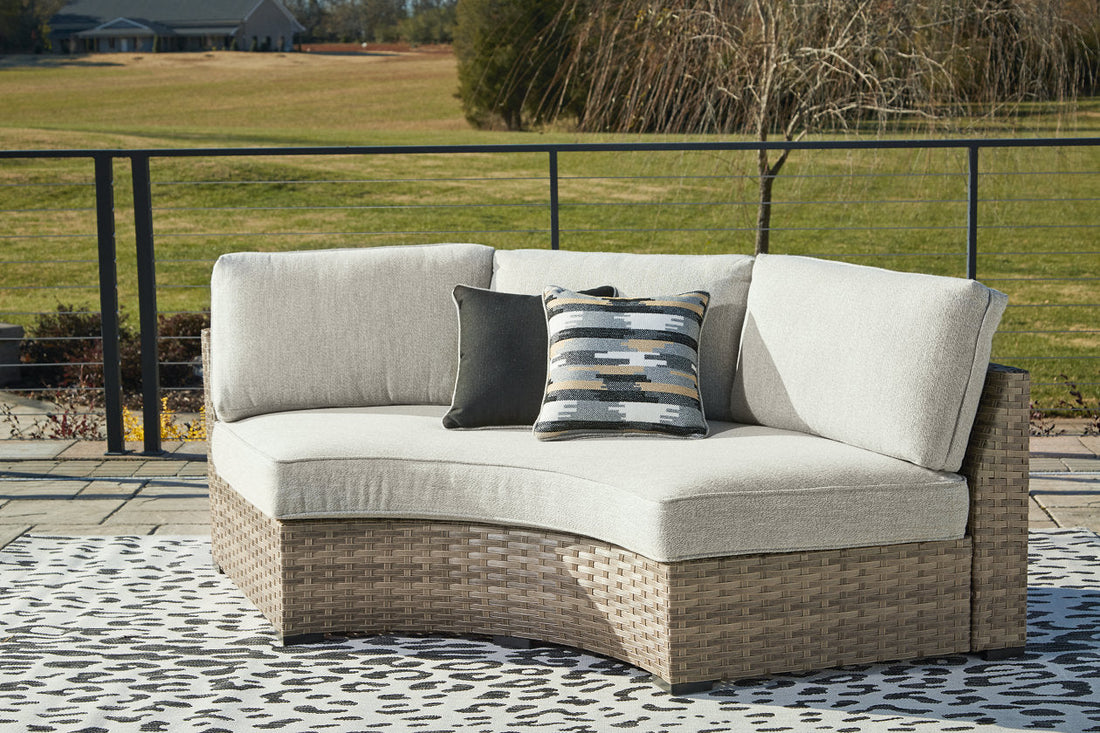 Calworth Beige Outdoor Curved Loveseat with Cushion - P458-861 - Bien Home Furniture &amp; Electronics