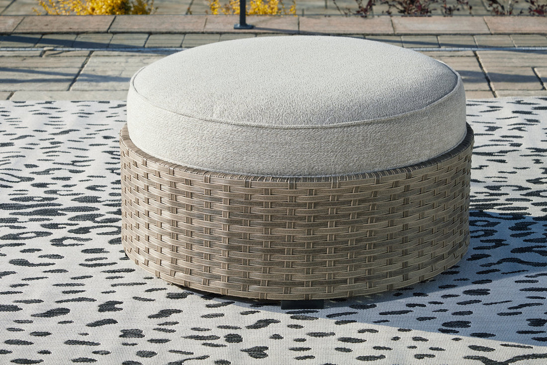 Calworth Beige Outdoor Ottoman with Cushion - P458-814 - Bien Home Furniture &amp; Electronics