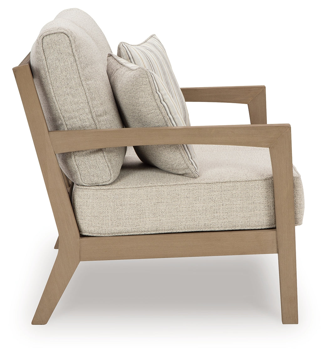 Hallow Creek Driftwood Outdoor Loveseat with Cushion - P560-835 - Bien Home Furniture & Electronics