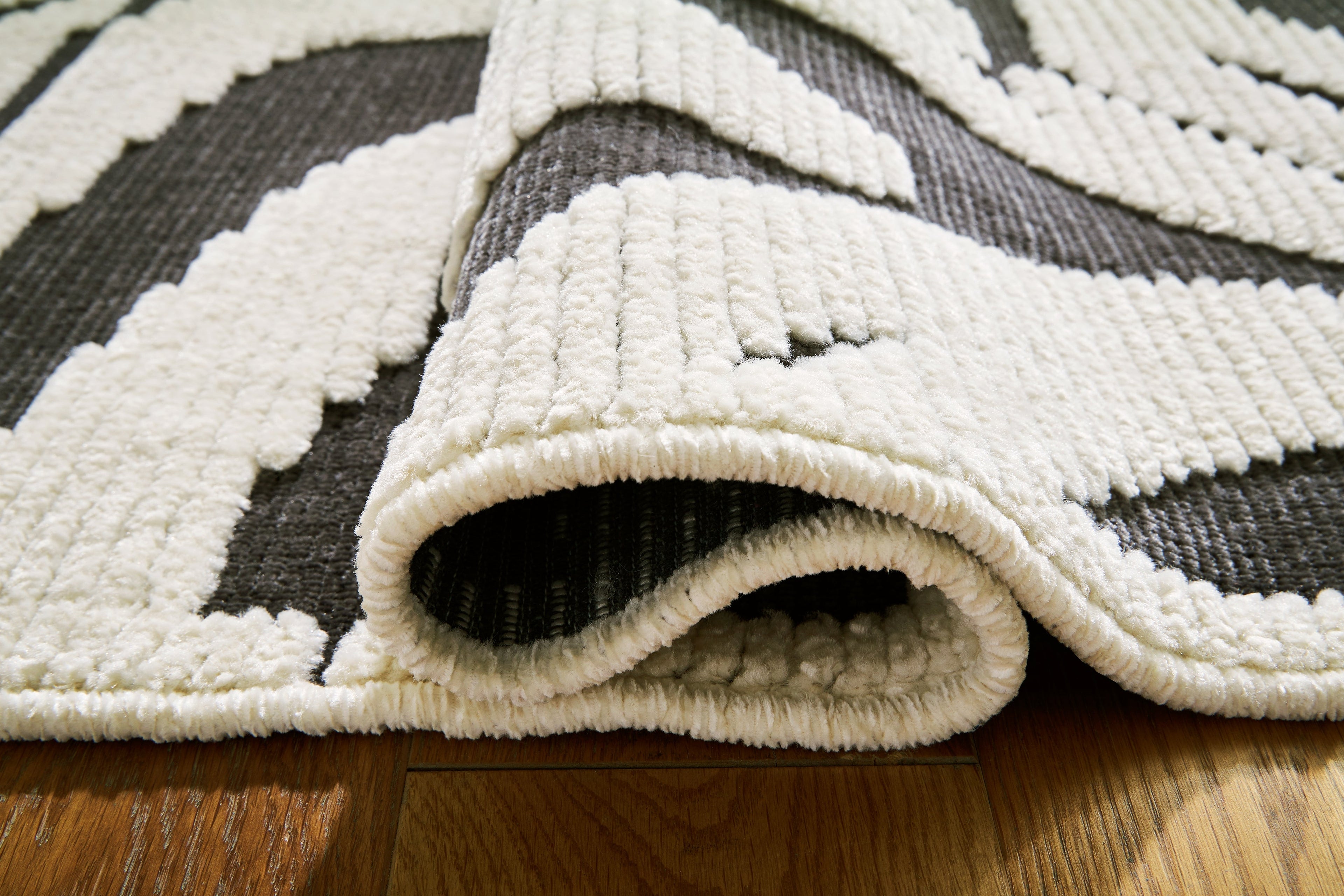 Thomwith Black/Ivory Large Rug - R406291 - Bien Home Furniture & Electronics