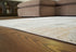 Truward Linen/Gray/Caramel Large Rug - R406471 - Bien Home Furniture & Electronics