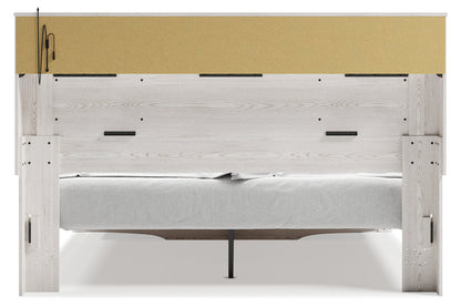 Altyra White King Upholstered Bookcase Bed with Storage from Ashley - Luna Furniture
