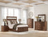 Taffenbrook Medium Brown Panel Bedroom Set from Ashley - Luna Furniture