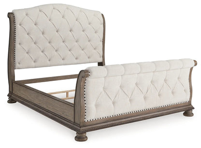Ardenfield Light Brown King Upholstered Sleigh Bed from Ashley - Luna Furniture