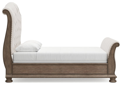 Ardenfield Queen Upholstered Sleigh Bed with Mirrored Dresser and Chest in Light Brown from Ashley - Luna Furniture