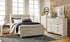 Bellaby Queen Panel Bed with Mirrored Dresser, Chest and Nightstand in Whitewash from Ashley - Luna Furniture