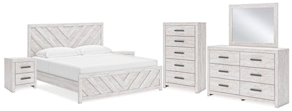 Cayboni King Panel Bed with Mirrored Dresser, Chest and 2 Nightstands in Whitewash - PKG019175