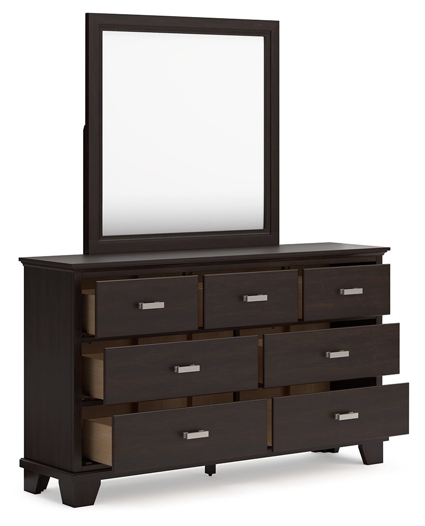Covetown King Panel Bed with Mirrored Dresser and Chest in Dark Brown from Ashley - Luna Furniture