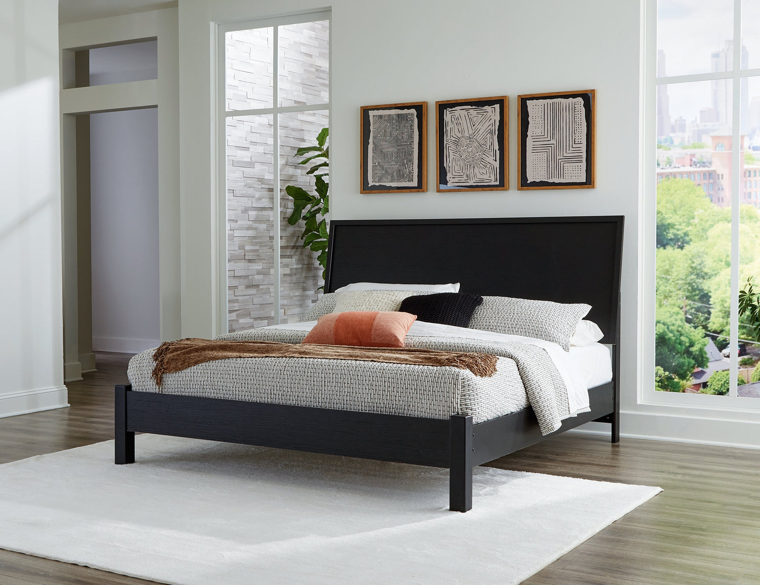 Danziar King Panel Bed with Mirrored Dresser and Chest in Black - PKG015887