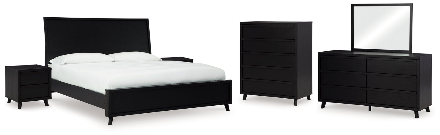 Danziar King Panel Bed with Mirrored Dresser, Chest and 2 Nightstands in Black - PKG015915