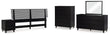 Danziar King Panel Headboard with Mirrored Dresser, Chest and Nightstand in Black - PKG016014