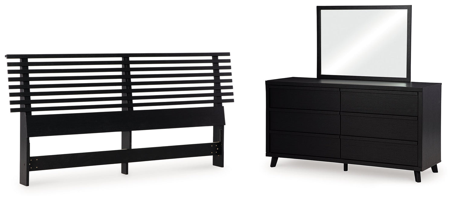 Danziar King Panel Headboard with Mirrored Dresser in Black - PKG016009