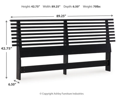 Danziar King Panel Headboard with Mirrored Dresser in Black - PKG016009