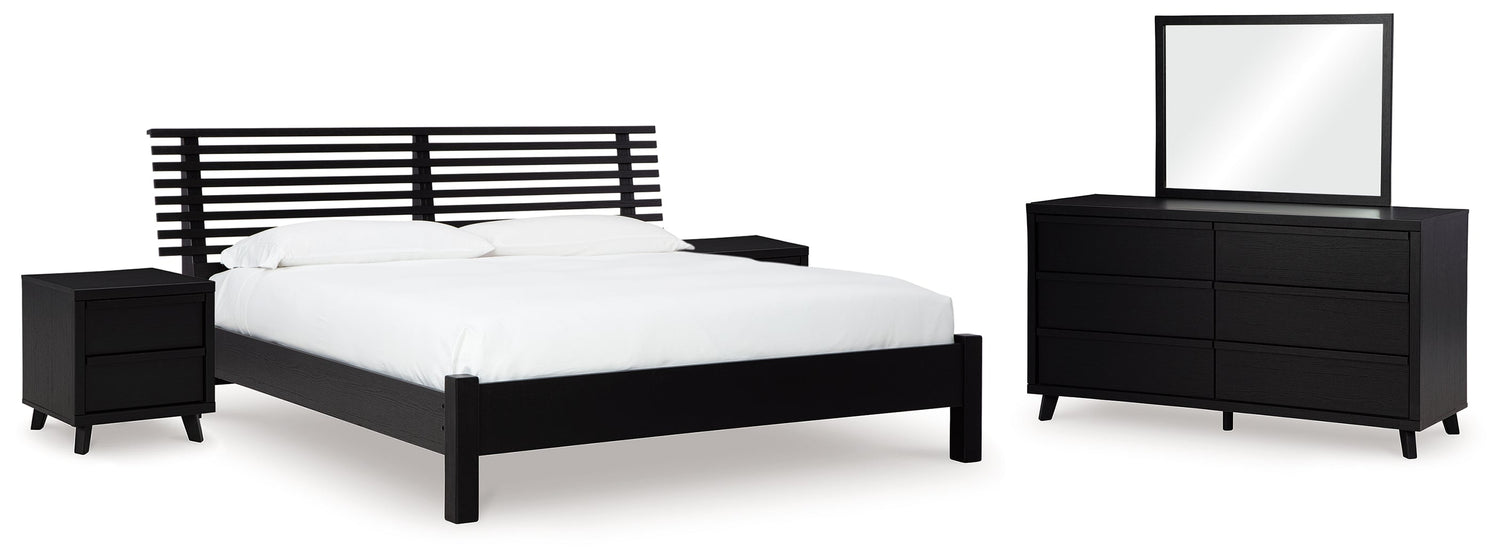 Danziar Queen Panel Bed with Mirrored Dresser and 2 Nightstands in Black - PKG015878