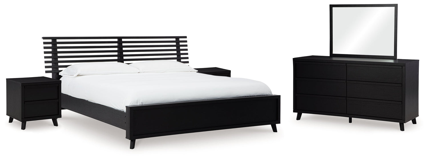 Danziar Queen Panel Bed with Mirrored Dresser and 2 Nightstands in Black - PKG015896
