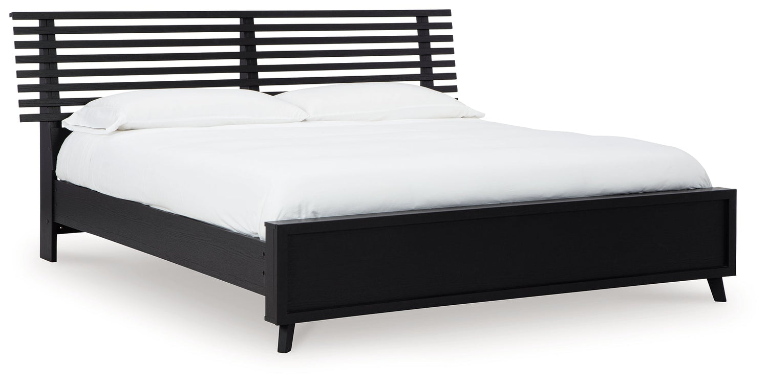 Danziar Queen Panel Bed with Mirrored Dresser and Nightstand in Black - PKG015898