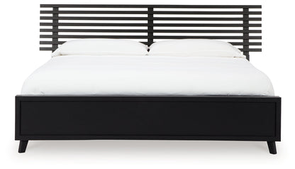 Danziar Queen Panel Bed with Mirrored Dresser and Nightstand in Black - PKG015898