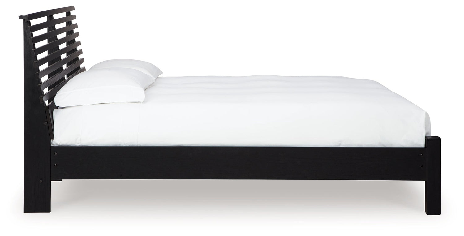 Danziar Queen Panel Bed with Mirrored Dresser, Chest and 2 Nightstands in Black - PKG015879