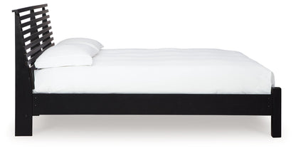 Danziar Queen Panel Bed with Mirrored Dresser, Chest and 2 Nightstands in Black - PKG015879