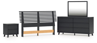 Danziar Queen Panel Headboard with Mirrored Dresser and Nightstand in Black from Ashley - Luna Furniture