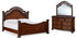 Lavinton Queen Poster Bed with Mirrored Dresser in Brown - PKG016856