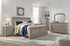 Lettner California King Panel Bed with Mirrored Dresser, Chest and Nightstand in Light Gray from Ashley - Luna Furniture