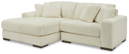 Lindyn 2-Piece Sectional with Ottoman in Ivory - PKG014502