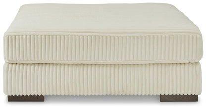 Lindyn 2-Piece Sectional with Ottoman in Ivory - PKG014502