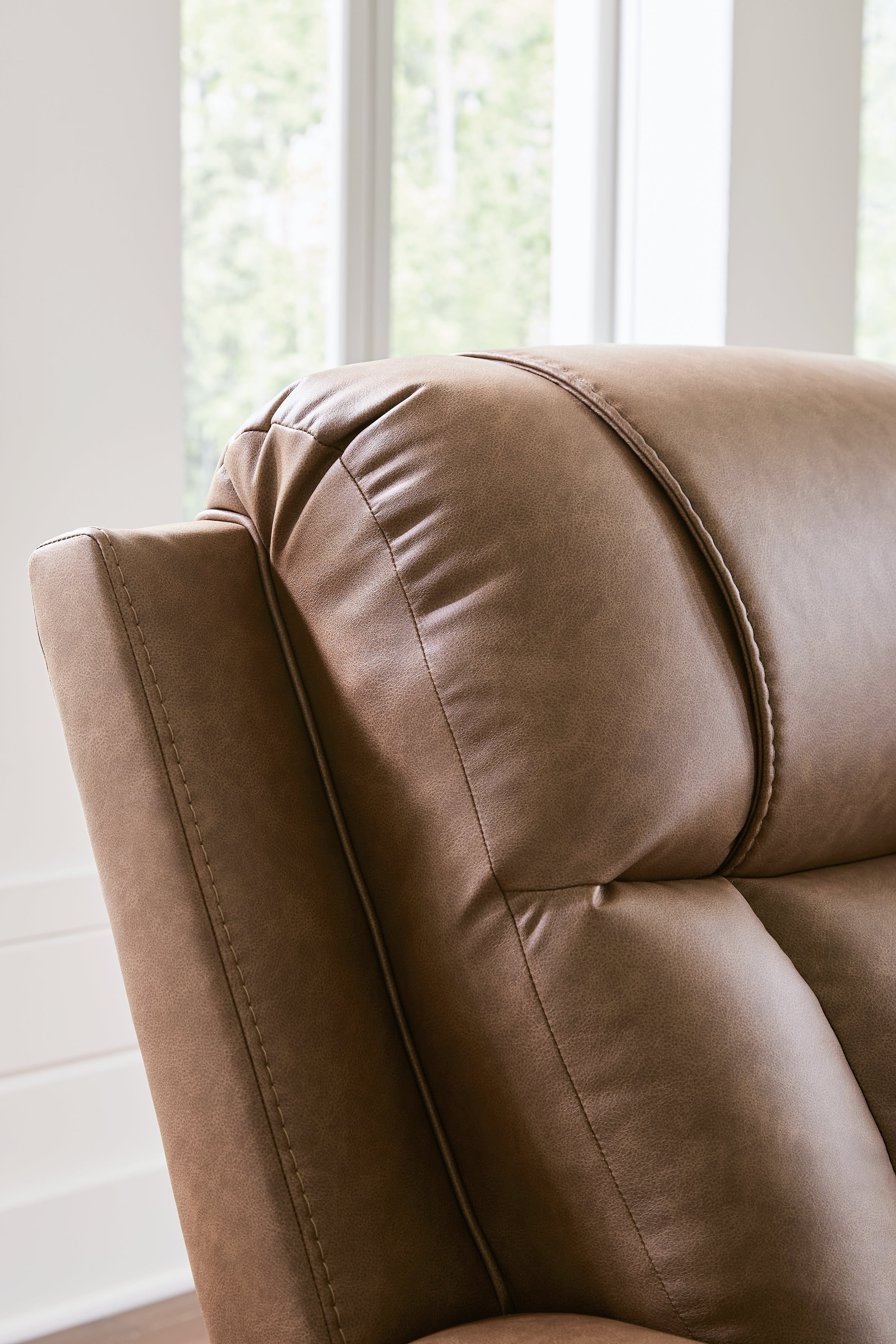 Mackmenville Caramel Reclining Loveseat with Console - 7471494