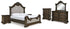 Maylee King Upholstered Bed with Mirrored Dresser, Chest and 2 Nightstands in Dark Brown from Ashley - Luna Furniture
