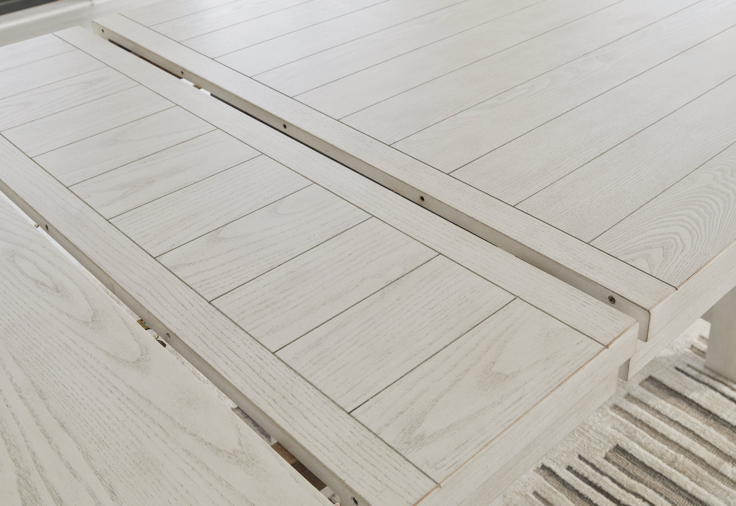 Robbinsdale Counter Height Dining Table and 8 Barstools in Antique White from Ashley - Luna Furniture