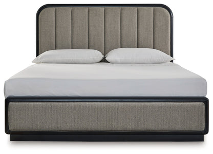 Rowanbeck King Upholstered Panel Bed with Mirrored Dresser, Chest and 2 Nightstands in Gray/Black from Ashley - Luna Furniture