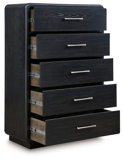 Rowanbeck King Upholstered Panel Bed with Mirrored Dresser, Chest and 2 Nightstands in Gray/Black from Ashley - Luna Furniture