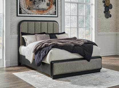 Rowanbeck Queen Upholstered Panel Bed with Mirrored Dresser and 2 Nightstands in Gray/Black from Ashley - Luna Furniture