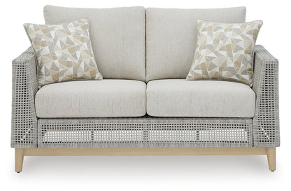 Seton Creek Outdoor Sofa and Loveseat with Coffee Table in Gray from Ashley - Luna Furniture