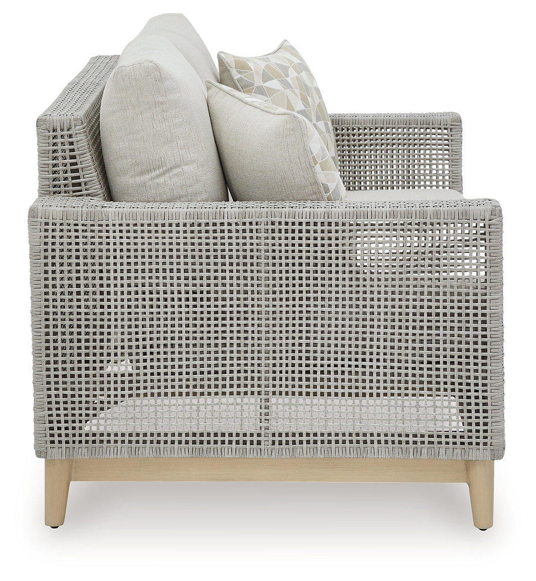 Seton Creek Outdoor Sofa and Loveseat with Coffee Table in Gray from Ashley - Luna Furniture