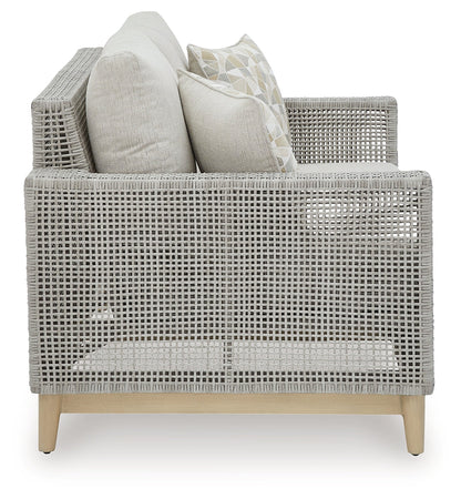 Seton Creek Outdoor Sofa and Loveseat with Coffee Table in Gray from Ashley - Luna Furniture