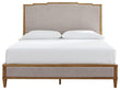 Sharlance California King Upholstered Panel Bed with 2 Nightstands in Light Brown from Ashley - Luna Furniture