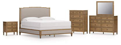 Sharlance King Upholstered Panel Bed with Mirrored Dresser, Chest and Nightstand in Light Brown from Ashley - Luna Furniture