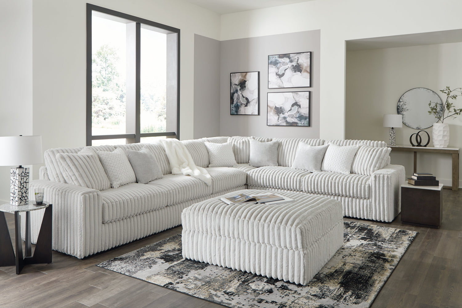 Stupendous 4-Piece Sectional with Ottoman in Alloy from Ashley - Luna Furniture
