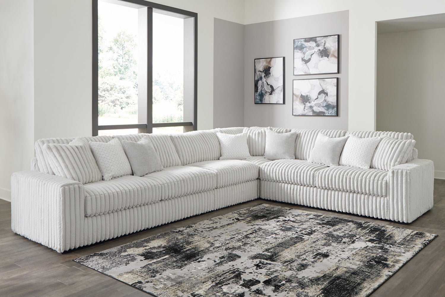 Stupendous 4-Piece Sectional with Ottoman in Alloy from Ashley - Luna Furniture