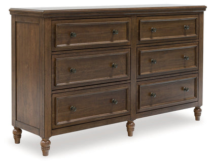 Sturlayne Brown Upholstered Panel Bedroom Set from Ashley - Luna Furniture